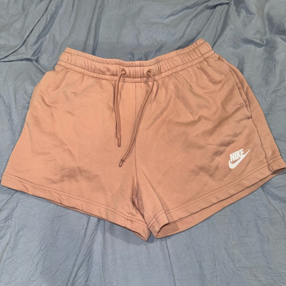 Nike Women's Athletic Shorts in a light burnt peach color
